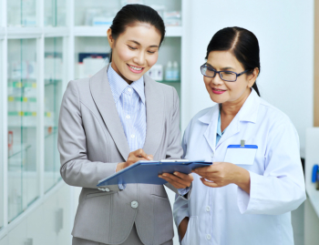 pharmacist and a woman talking